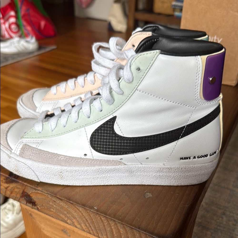 Nike White and Black High-Tops with Purple Accent